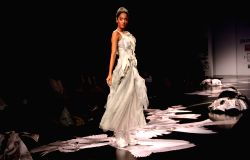 A model showcasing designer Gaurav Gupta's creation at the Wills Lifestyle India Fashion week in New Delhi on Tuesday 27 Oct 2009.
