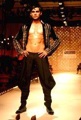 A model showcasing designer Rohit Bal's creation at the Ven Heusen India Mens Week, in New Delhi on Sunday.