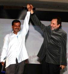 NDTV Chairman,Dr. Prannoy Roy, honouring Arvind Kejriwal "NDTV Indian of The Year Award",in New Delhi.