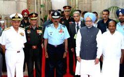Prime Minister Manmohan Singh at the combined commanders conference in New Delhi on Tuesday. Also seen are Defence Minister A.K. Antony (right) and (left to right) Indian Navy chief Admiral Nirmal...