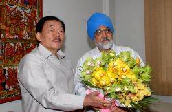Sikkim Chief Minister Pawan Chamling with Planning Commission Deputy Chairman Montek Singh Ahluwalia ahead of their meeting to finalise the state's annual plan for the current fiscal in New...
