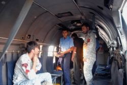 The injured Iranian crewmember being treated on board the Indian Navy SAR (Search and Rescue) Seaking helicopter (Photo: Ministry of Defence).