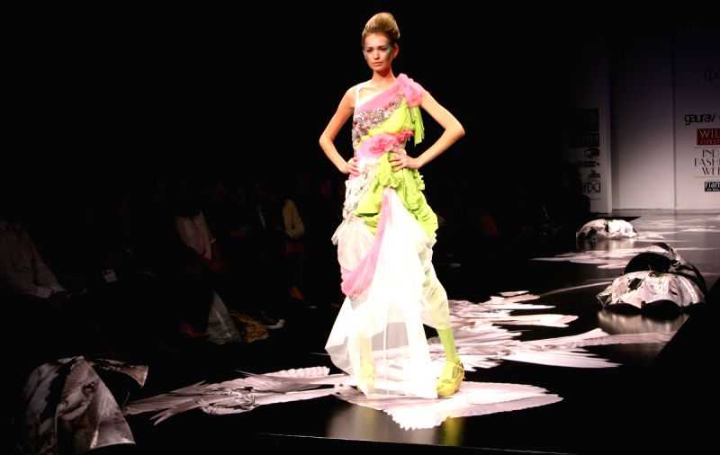 A model showcasing designer Gaurav Gupta's creation at the Wills Lifestyle India Fashion week in New Delhi on Tuesday 27 Oct 2009.
