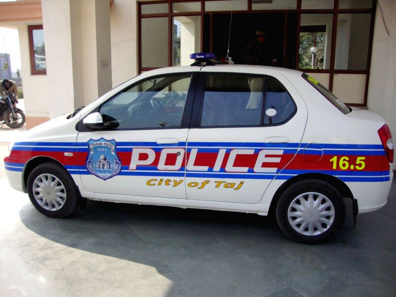 A police patrol car stands outside a gate of Taj Mahal in Agra.