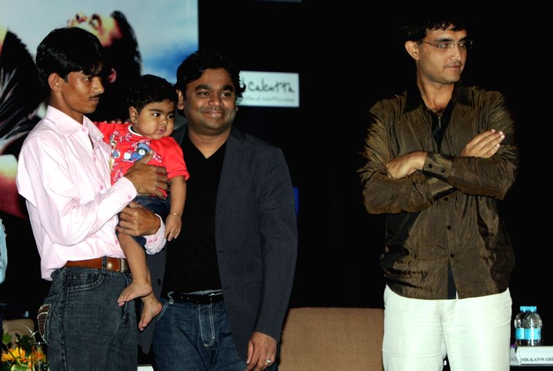 A.R. Rahman shares a charity stage in Kolkata on 14th Oct 09 he is at a press conferance on 13oct. Sourav Ganguly also in the picture.
