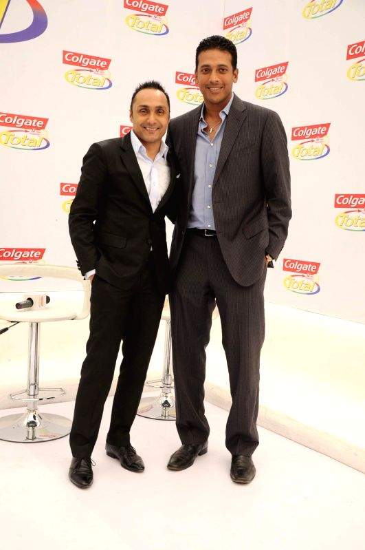 Bollywood actor Rahul Bose and tennis champion Mahesh Bhupati pose as part of the Colgate total campaigning for "Healthy Mouth" in Mumbai.