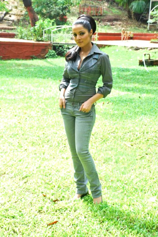 Bollywood actress Celina Jaitley posing for the shutterbugs at a press meet where she spoke about "Anti Gay Rights".