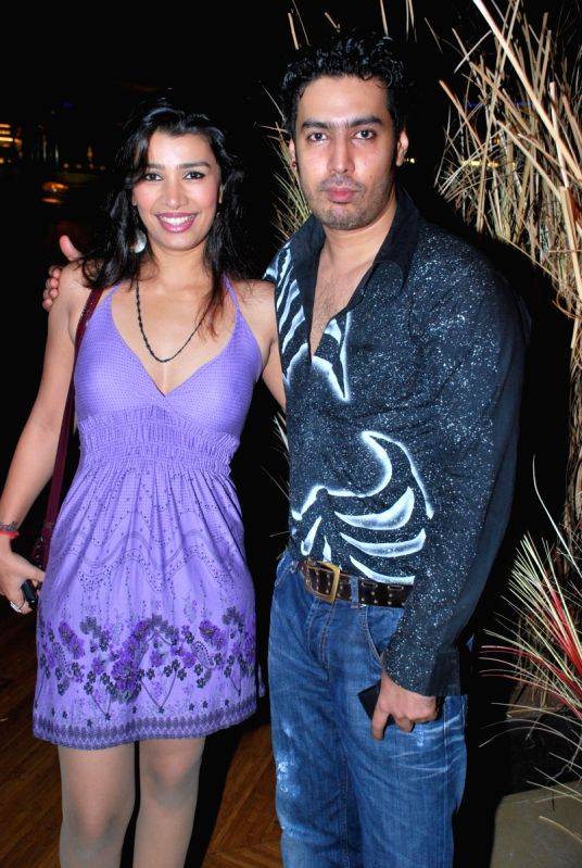Bollywood actress Mink with a friend at the Hi Lounge reopening in Mumbai.