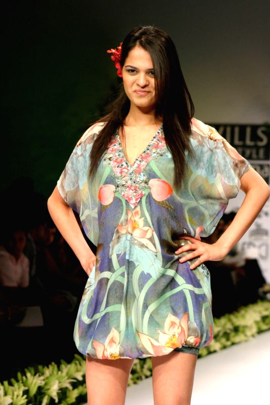Chess Player Tania Sachdev on the ramp during "The Ashima and Leena Show" at the Wills Lifestyle India Fashion Week in New Delhi on Saturday 24 Oct 09.