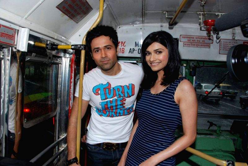 Emran Hashmi and Prachi Desai travel by bus to promote their film "Once upon a time in Mumbai" at Churchgate.