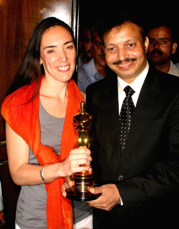 Filmmaker Megan Mylan and Dr Subodh at the Premier Remier of the film ''Smile Pinki'' at PVR Plaza, in New Delhi on Thrusday 08th Oct 09. [Photo: IANS]
