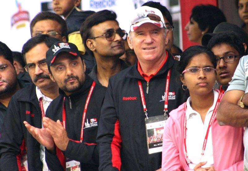 Former Australian cricket captain Allan Border and bollywood actor Rahul Bose at the Airtel Delhi Half Marathon, in New Delhi on Sunday.