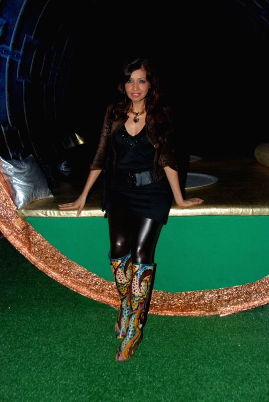 Guest at 100 Lounge opening.