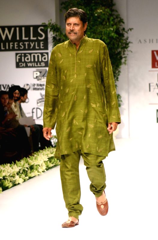 Kapil Dev on the ramp during "The Ashima and Leena Show" at the Wills Lifestyle India Fashion Week in New Delhi on Saturday 24 Oct 09.