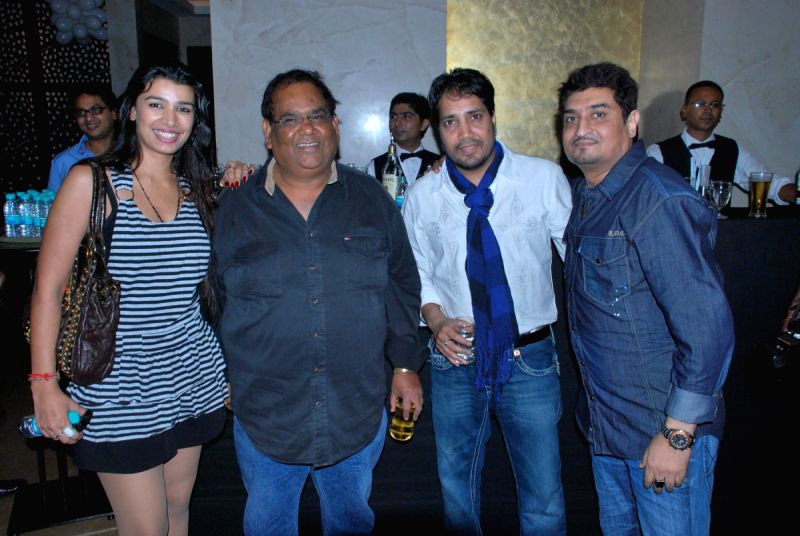 Mink, Satish Kaushik and Mika at Neeraj Shridhar's son Neevan's birthday bash at Lokhandwala, in Mumbai.