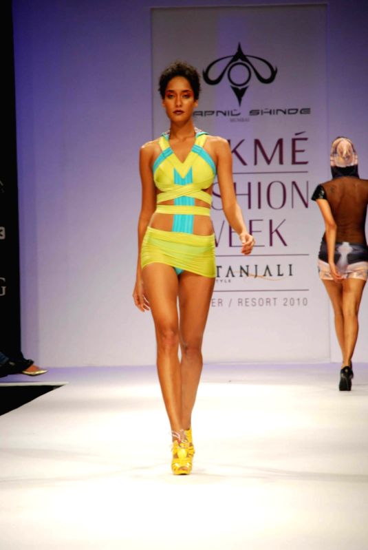 Model walks on the ramp for designer Swapnil Shinde at Lakme Fashion Week 2010.