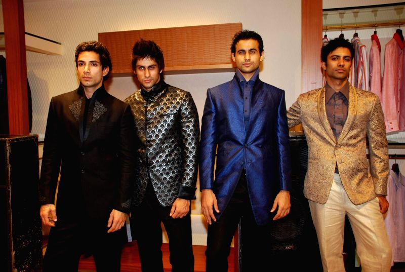 Models at Narendra Kumar Ahmed's Men's Collection launch, AZA.