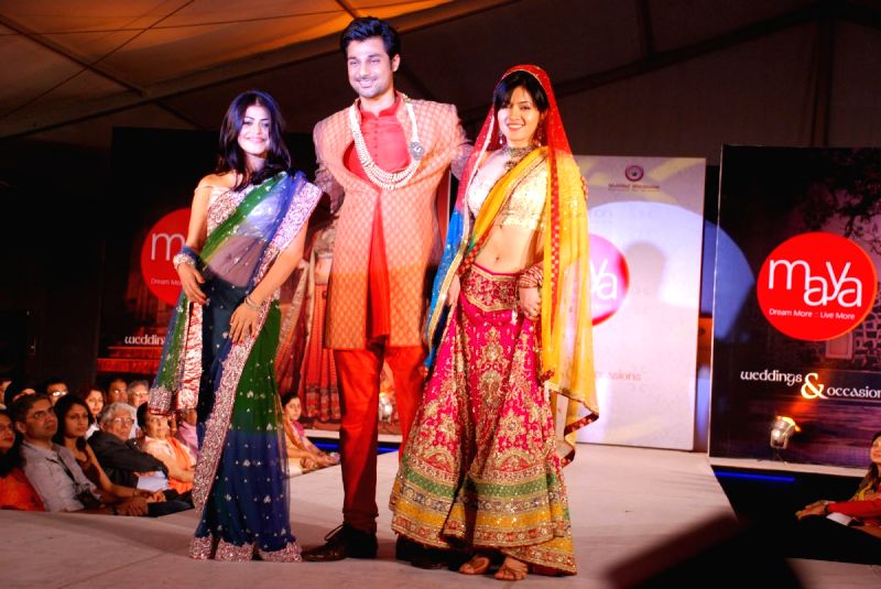 Models walk on ramp at the Luxurion show at Grand Hyatt.