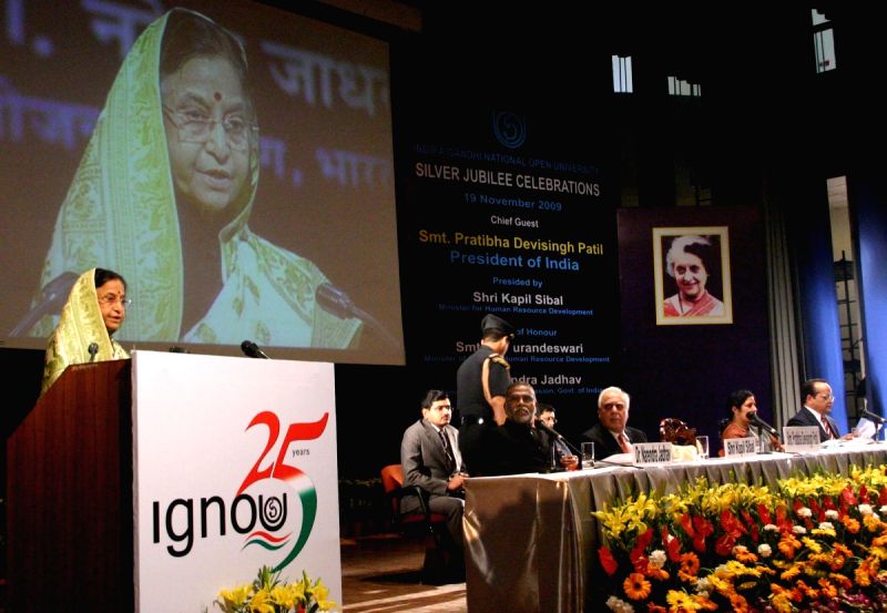 President Pratibha Devisingh Patil launching ''flexi-learning platform'' at the Silver Jubille Celebration of Indira Gandhi National Open University in New Delhi on Thursday also in photo HRD Ministers Kapil Sibal and D. Purandeswari, planning commission member Dr Narendra Jadhav and vice-chancellor V N Rajasekharan Pillai