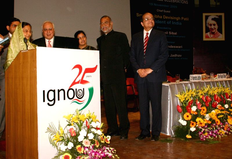 President Pratibha Devisingh Patil launching ''flexi-learning platform'' at the Silver Jubille Celebration of Indira Gandhi National Open University in New Delhi on Thursday also in photo HRD Ministers Kapil Sibal and D. Purandeswari, planning commission member Dr Narendra Jadhav and vice-chancellor V N Rajasekharan Pillai