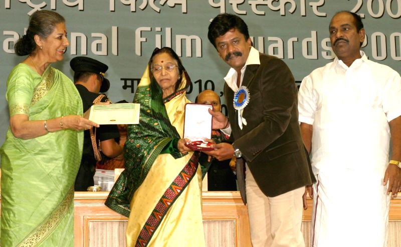 President Pratibha Devisingh Patil presenting best actor award to Upendra Limaye at the ''56 National Film Awards'', in New Delhi on Friday.