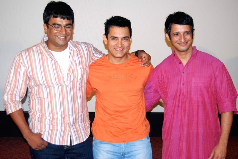 R Madhavn, Aamir Khan and Sharman Joshi at 3 Idiots First Song Introduced to Media at Intercontinnetal.