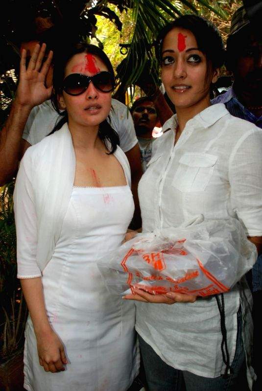Riya and Raima Sen play Holi at Azmi House.