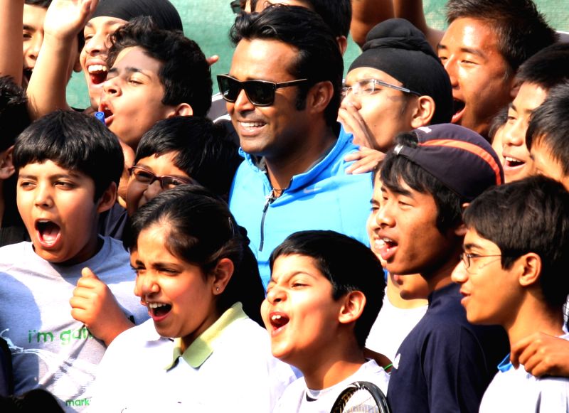 Sports legends Leander Paes at the "Fit India Come N' Play Day" event,in New Delhi on Sunday.