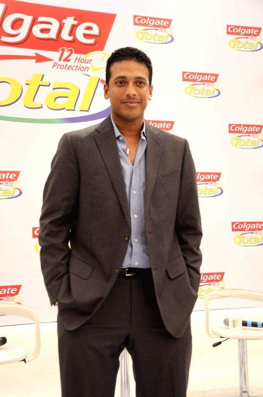 Tennis champion Mahesh Bhupati pose as part of the Colgate total campaigning for "Healthy Mouth" in Mumbai.