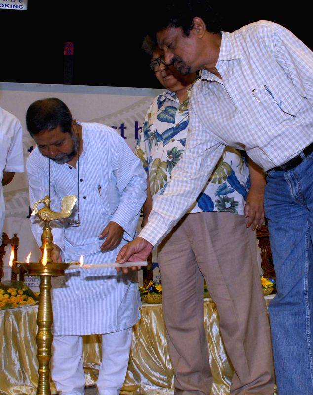 West Bengal tourism minister Manabendra Mukherjee, renowned author Sunil Gangopadhyay and reputed filmmaker Gautam Ghosh at the inauguration ceremony of 'TOURIST SPOT' the travel and tourism fair in Kolkata on Friday 26th June 09. (IANS Photo)