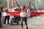 Ethiopian athlete Deriba Merga reaches the finishing line. Mergia won the Airtel Delhi Half Marathon for men,in New Delhi on Sunday.