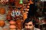 Raju shows Lord Ganesha's face which he imported from Kolkata.