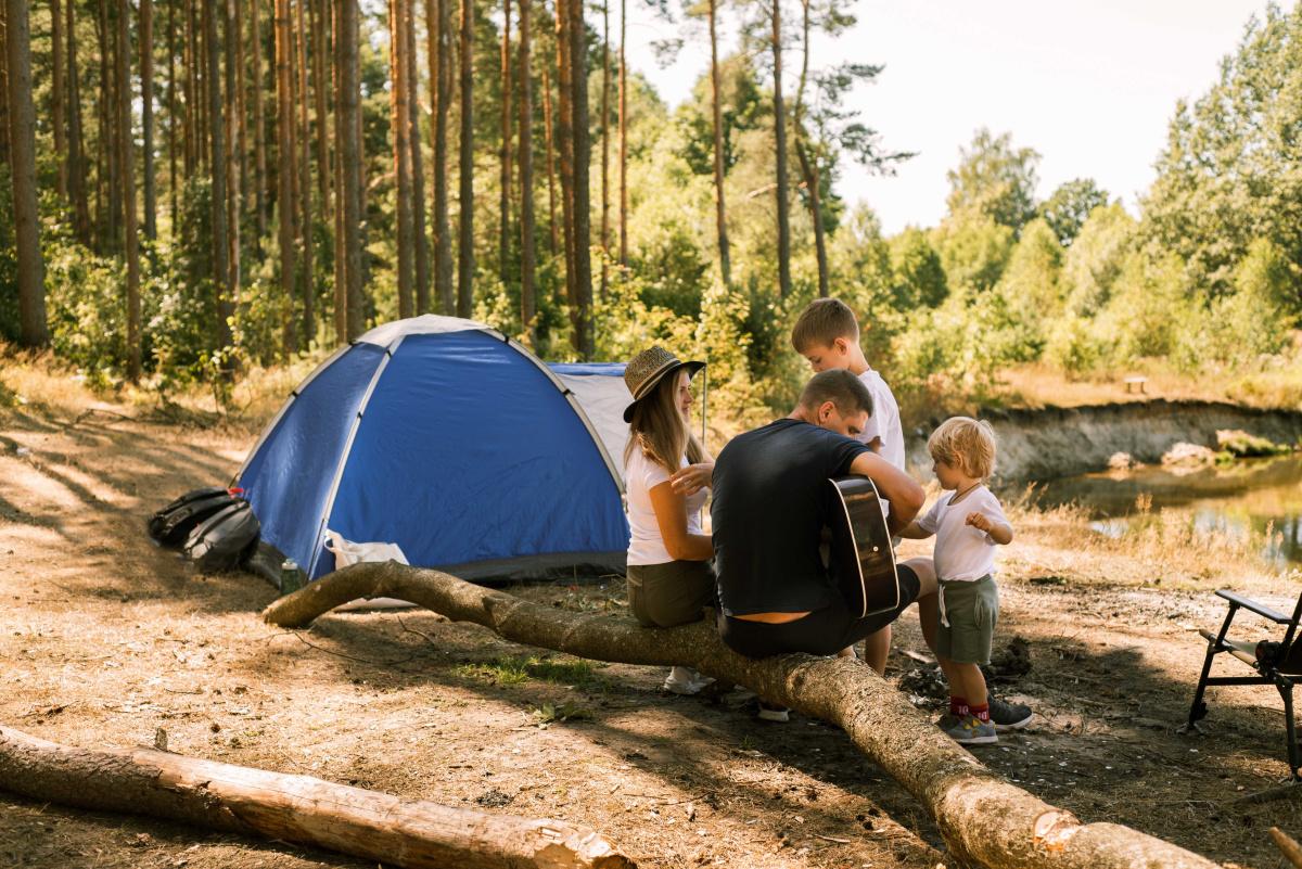 Family camping in forest