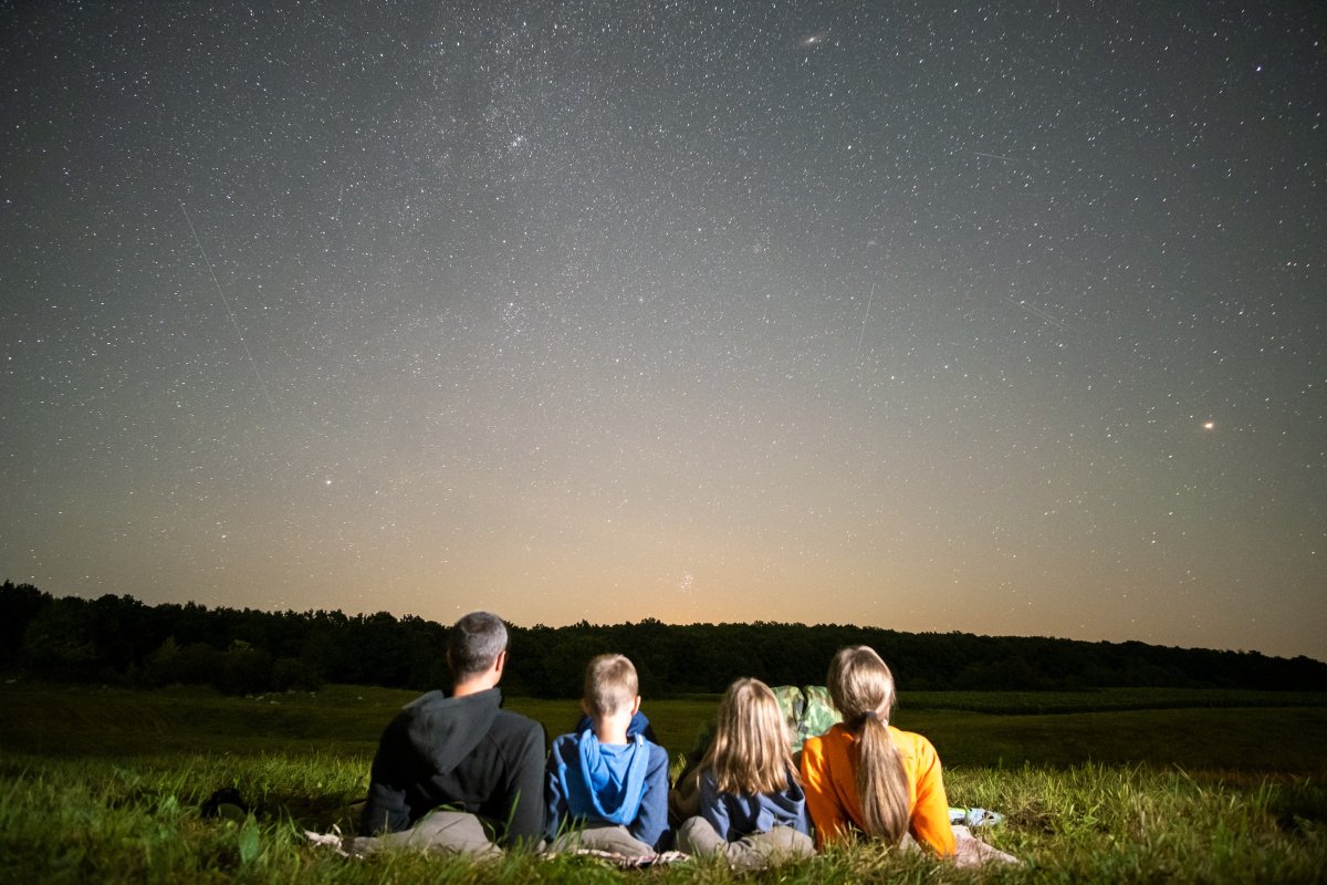 Family enjoying stargazing