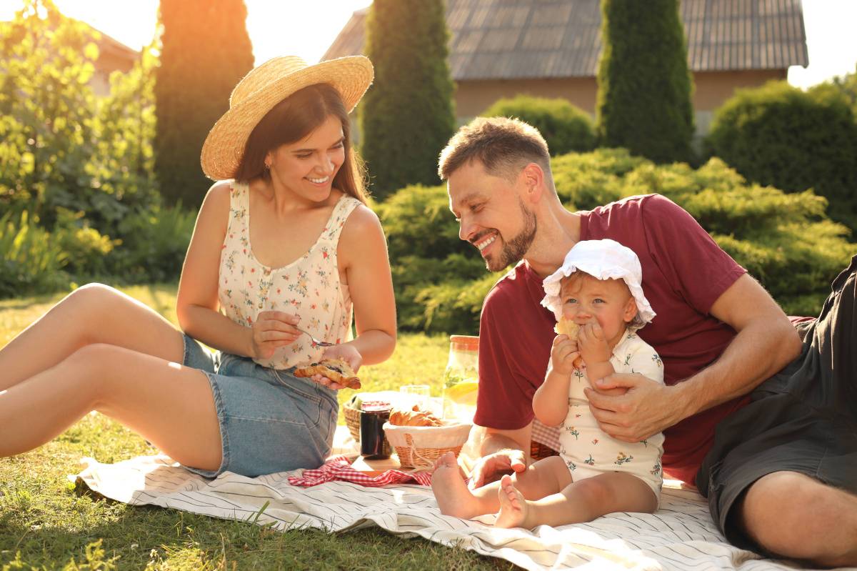 Happy family enjoying picnic
