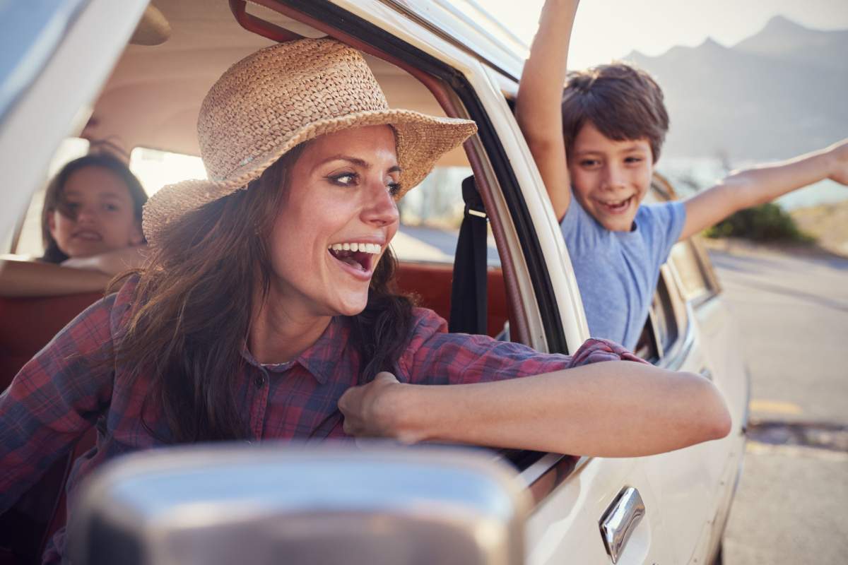 Mother and children Relaxing In Car
