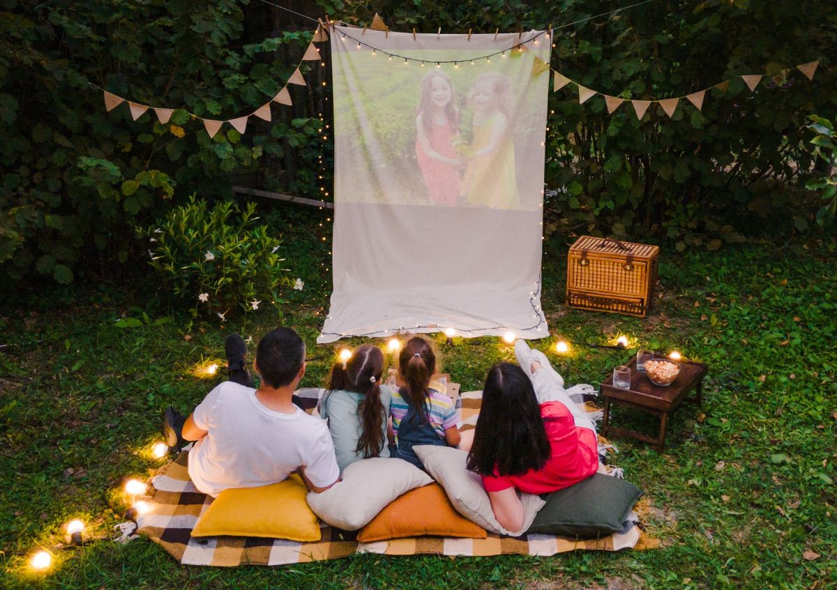Parent and children watching movie