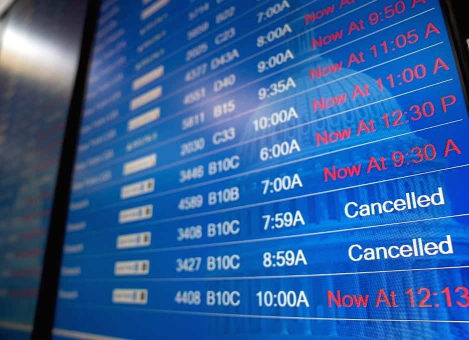 Virginia :A flight information screen is seen at Ronald Reagan ...