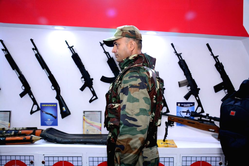 A security personnel wears India's Lightest Bullet Proof Jacket ,Bhabha Kavach, that was launched by Ordnance Factory Board at the International Police Expo 2019, at Pragati Maidan in New ...