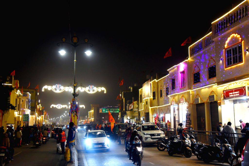 A view of the illuminated road ahead of the Ram temple consecration ...