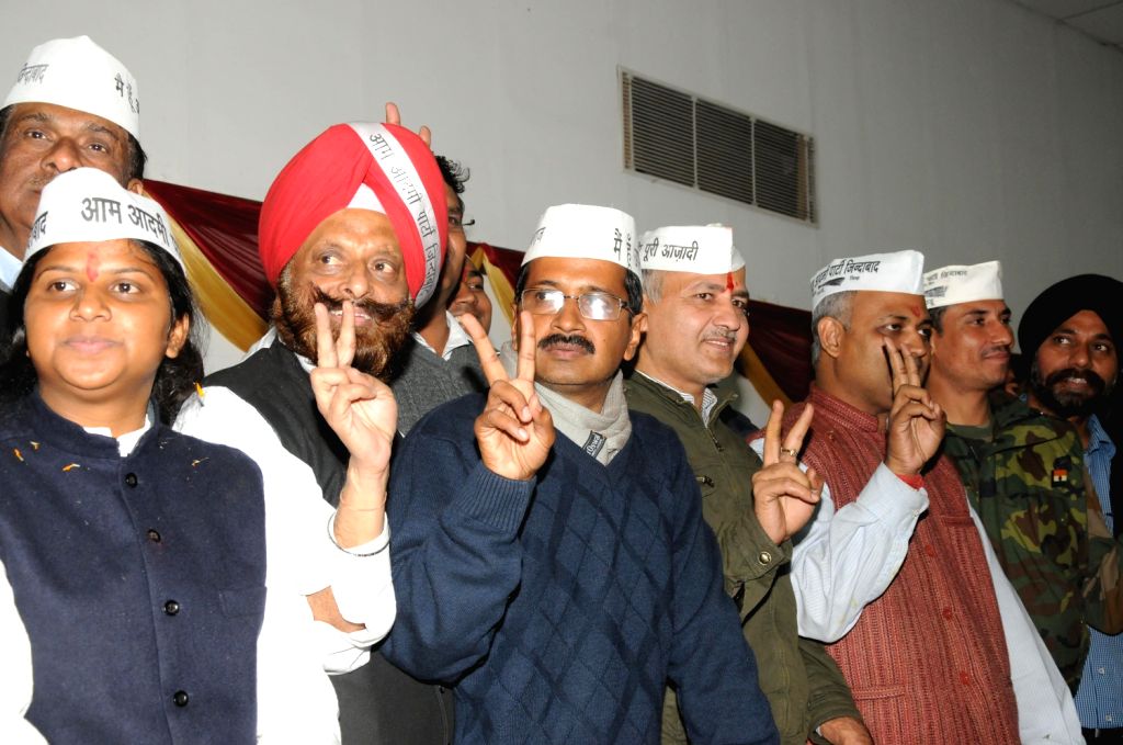 Arvind Kejriwal with party's winning candidates during a meeting