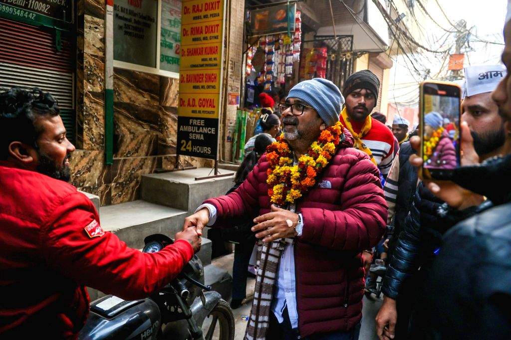 AAP candidate Awadh Ojha conducts door-to-door campaigning at Mandawali