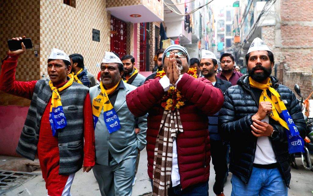 AAP candidate Awadh Ojha conducts door-to-door campaigning at Mandawali