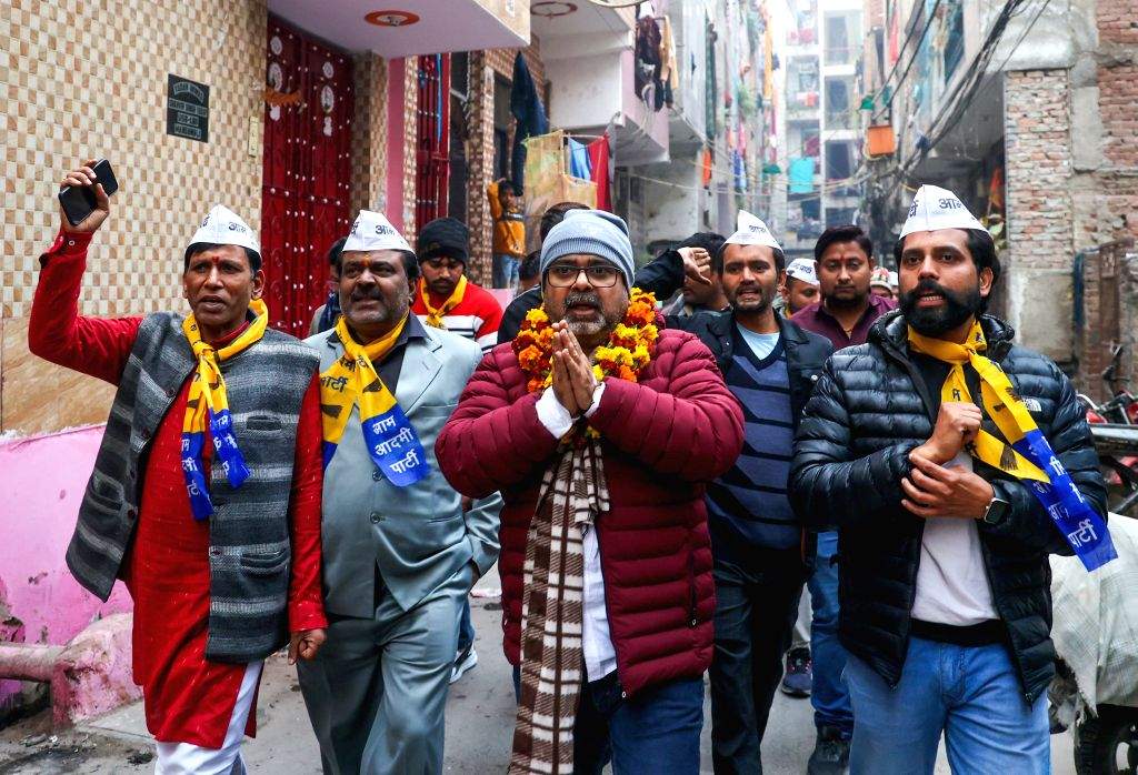 AAP candidate Awadh Ojha conducts door-to-door campaigning at Mandawali