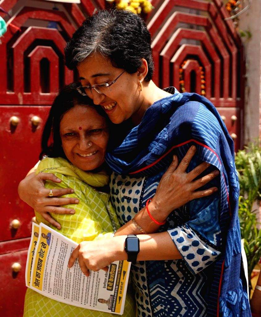 AAP leader Atishi during her Door to Door campaign in support of party ...