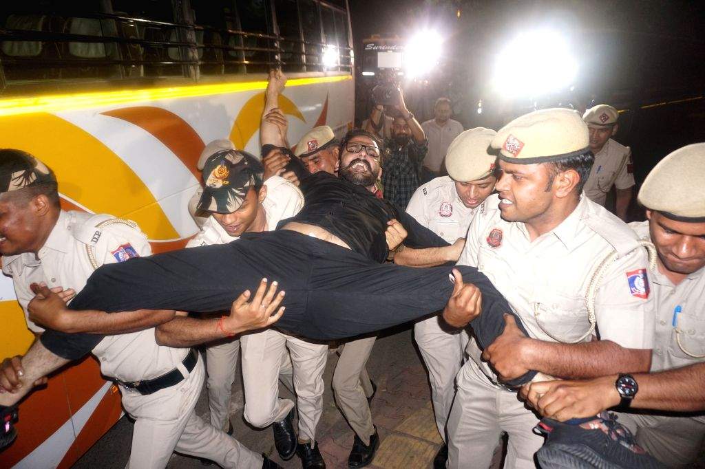 AAP leaders being detained during a protest outside the residence of ...