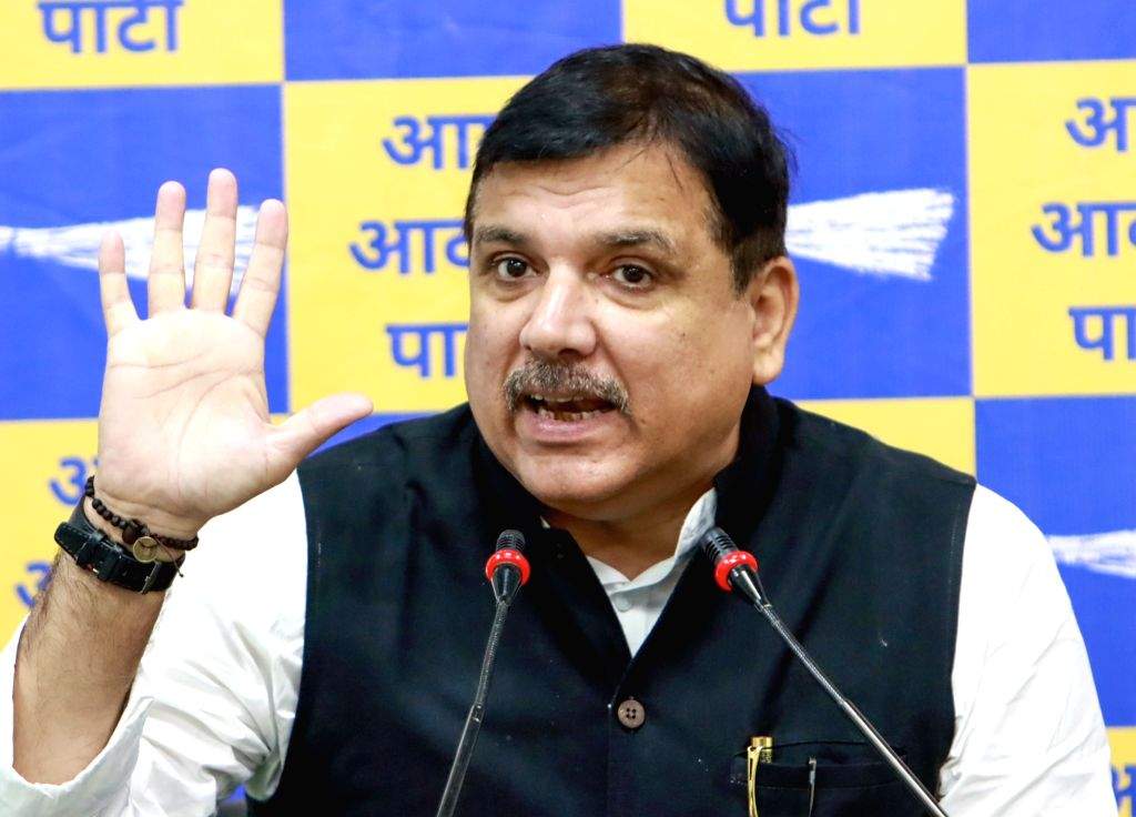 AAP MP Sanjay Singh addresses a press conference at party office