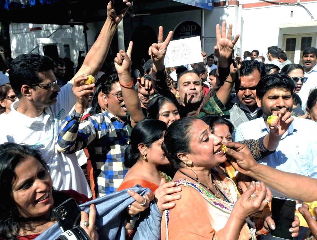 New Delhi: AAP supporters celebrate after the party's winning in Delhi ...