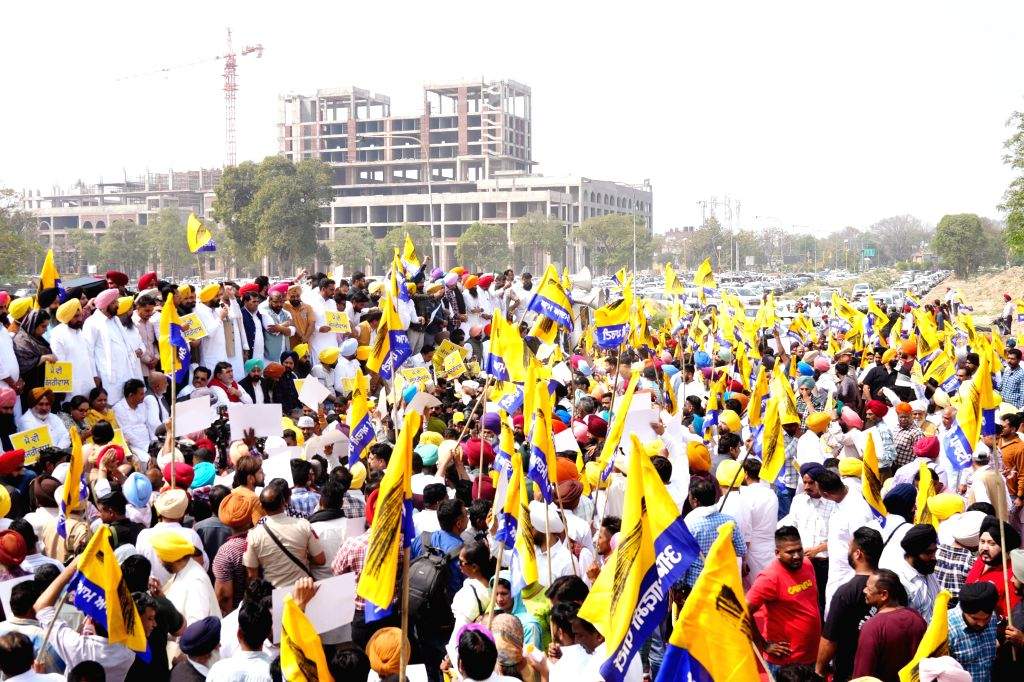AAP supporters stage a protest against the arrest of Chief Minister ...