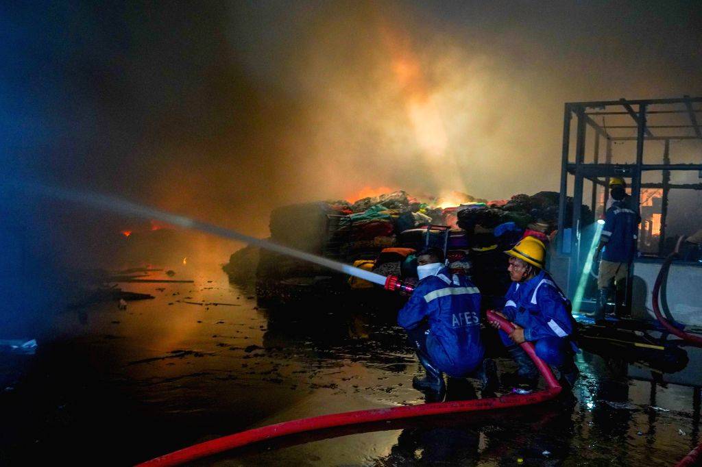 Ahmedabad : Firefighters try to douse a fire after it breaks out at a ...